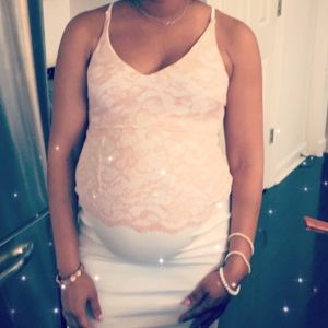 Pink and white maternity dress.